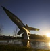 Static display aircraft at sunrise