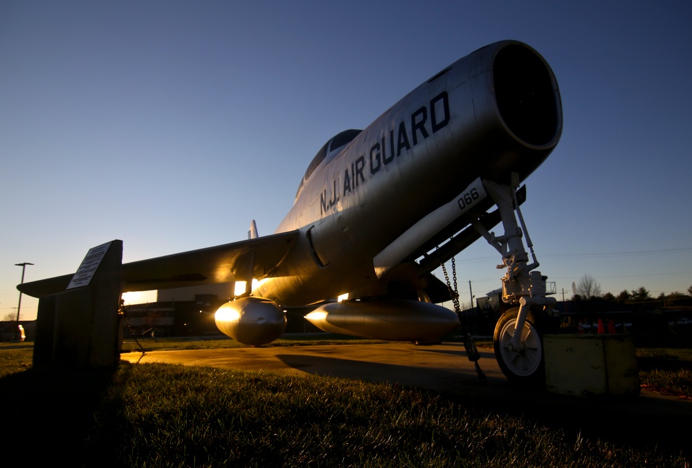 Static display aircraft at sunrise