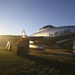 Static display aircraft at sunrise