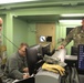 Soldiers work to coordinate communications