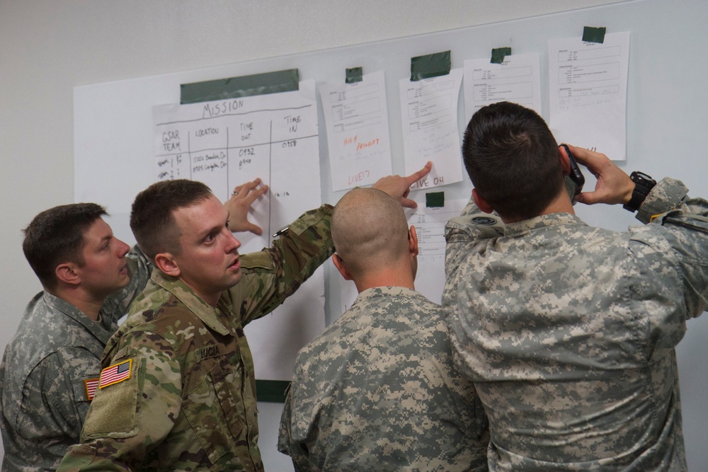 Soldiers work to coordinate during winter emergency response training