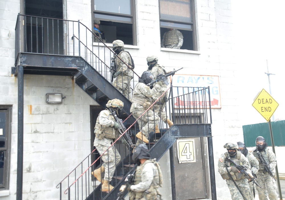 New York Army National Guard Soldiers hone urban combat skills at New York City police training site