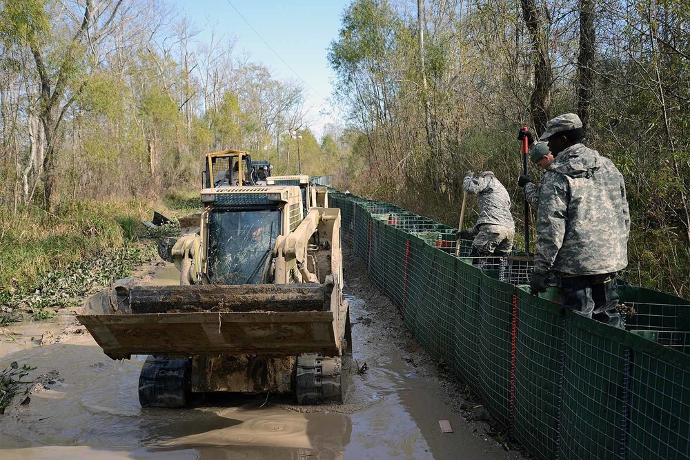 Louisiana Guardsmen continue building, monitoring flood barriers