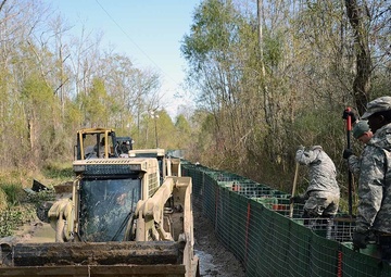 Louisiana Guardsmen continue building, monitoring flood barriers