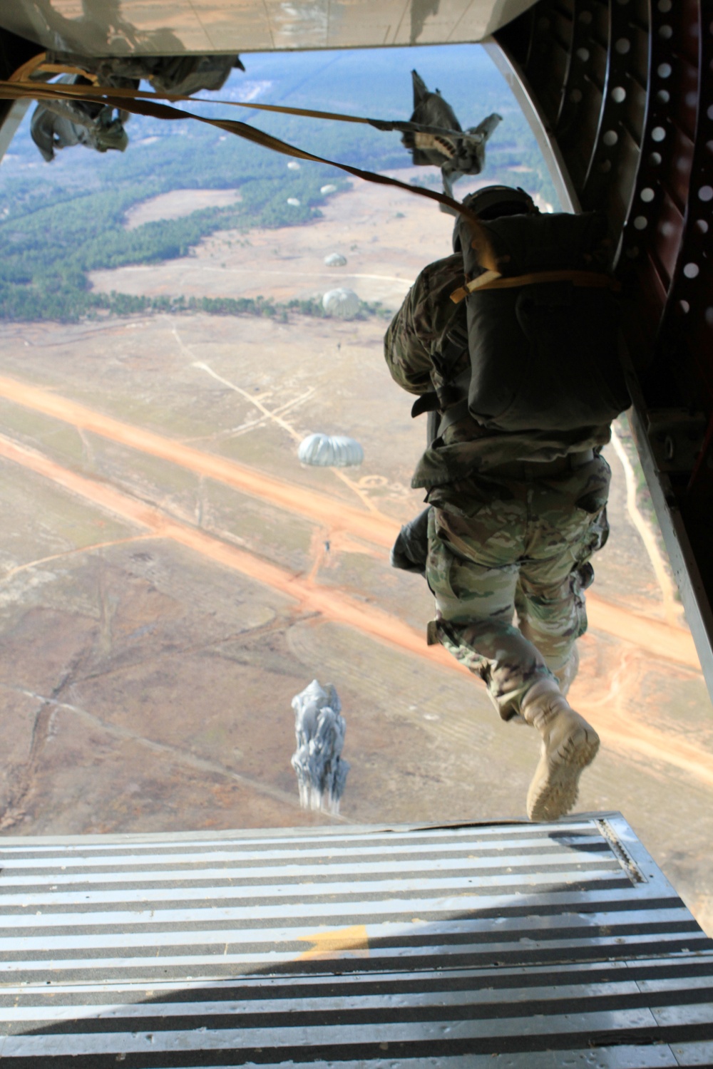 US Army paratroopers with US Army John F. Kennedy Special Warfare Center and School conduct airborne operations