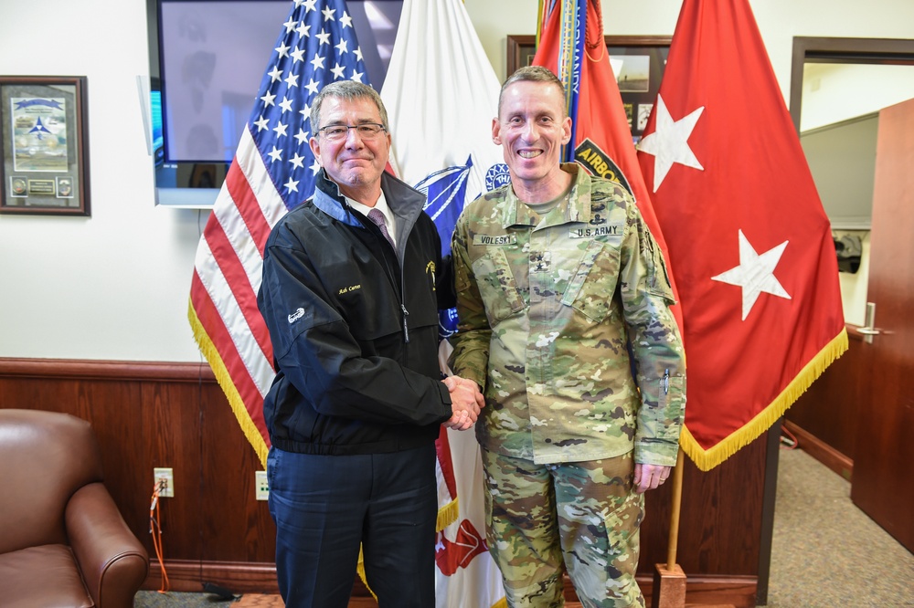 Secretary of defense and Maj. Gen. Volesky take a photo together