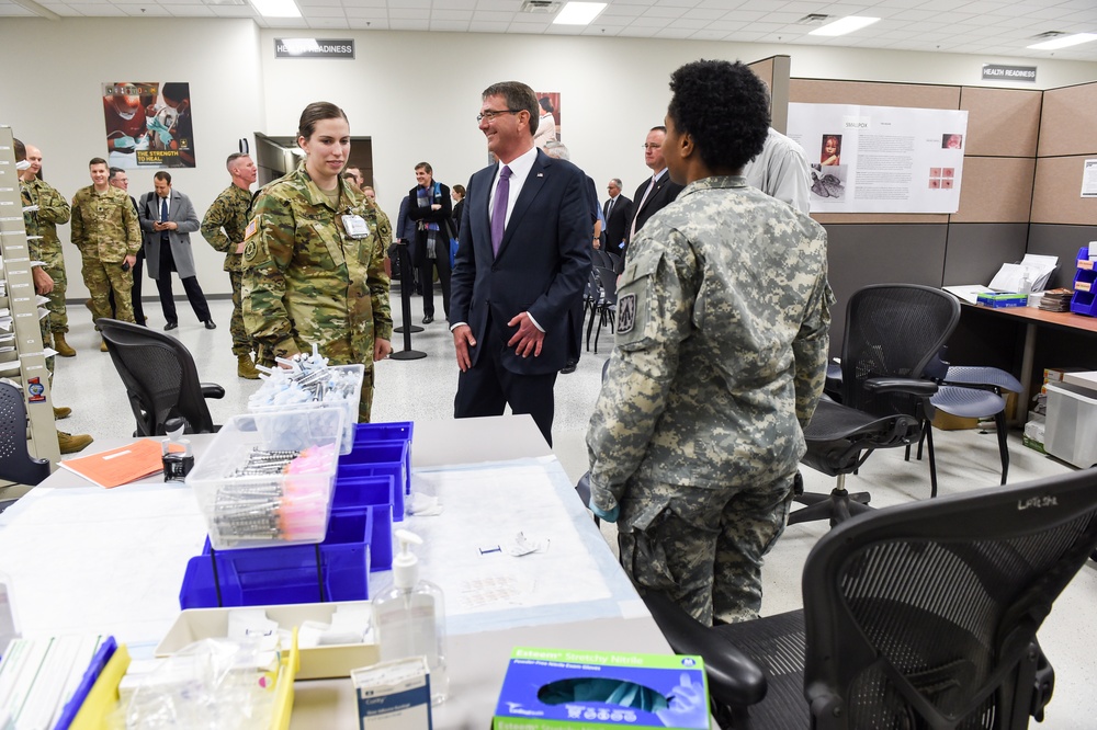 Secretary of defense visits with soldiers at the SRP center