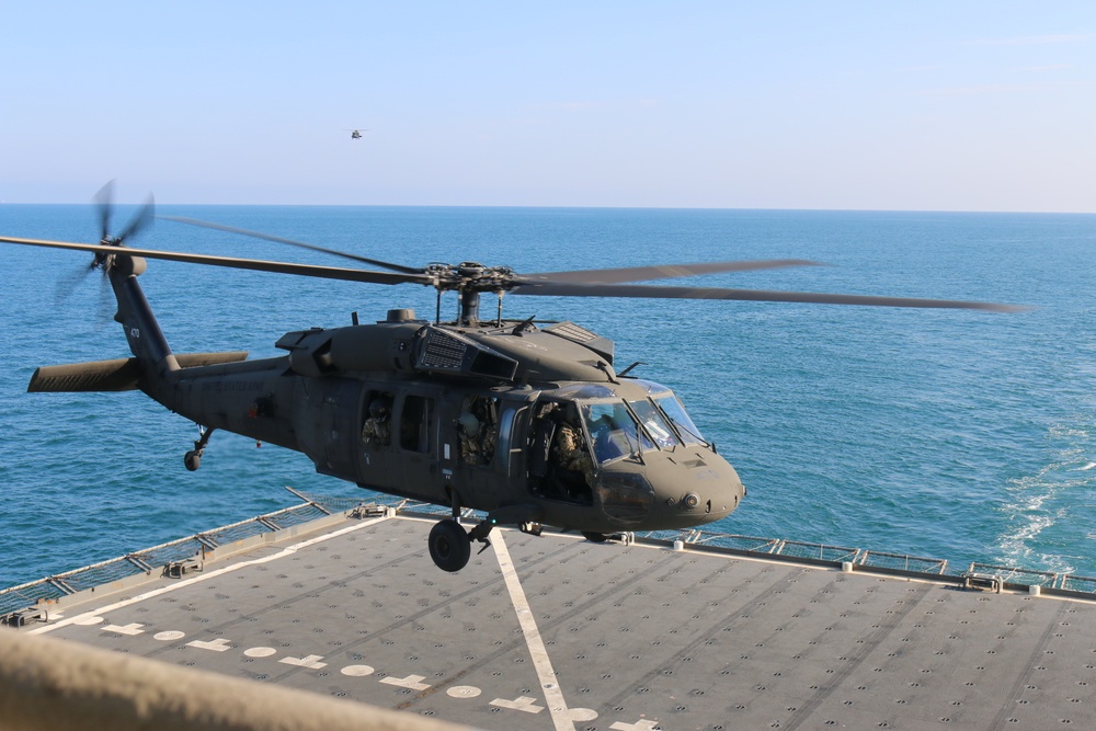 40th CAB helicopters land aboard the USNS Alan Shepard