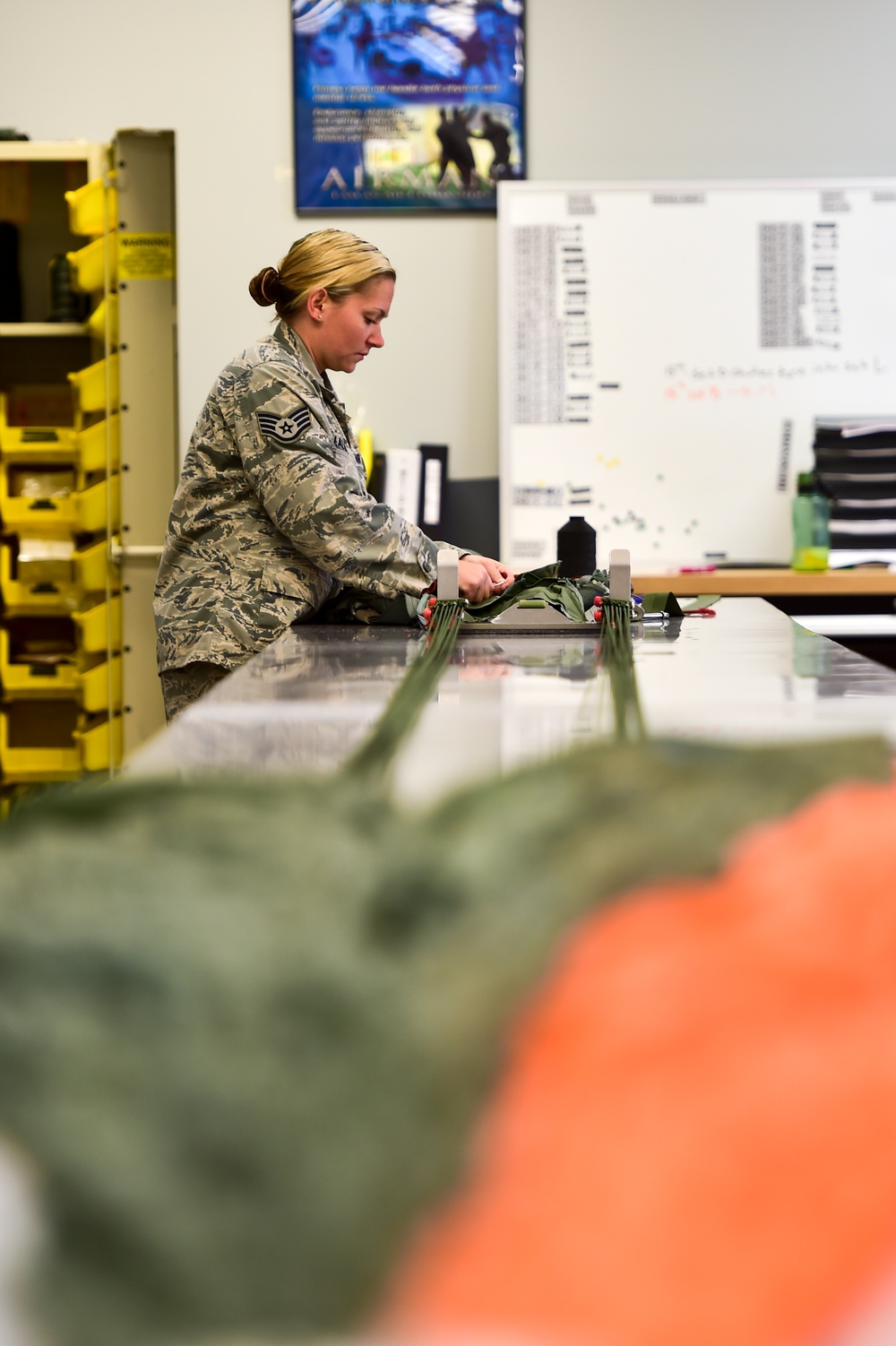 Aircrew flight equipment Airmen pack parachutes