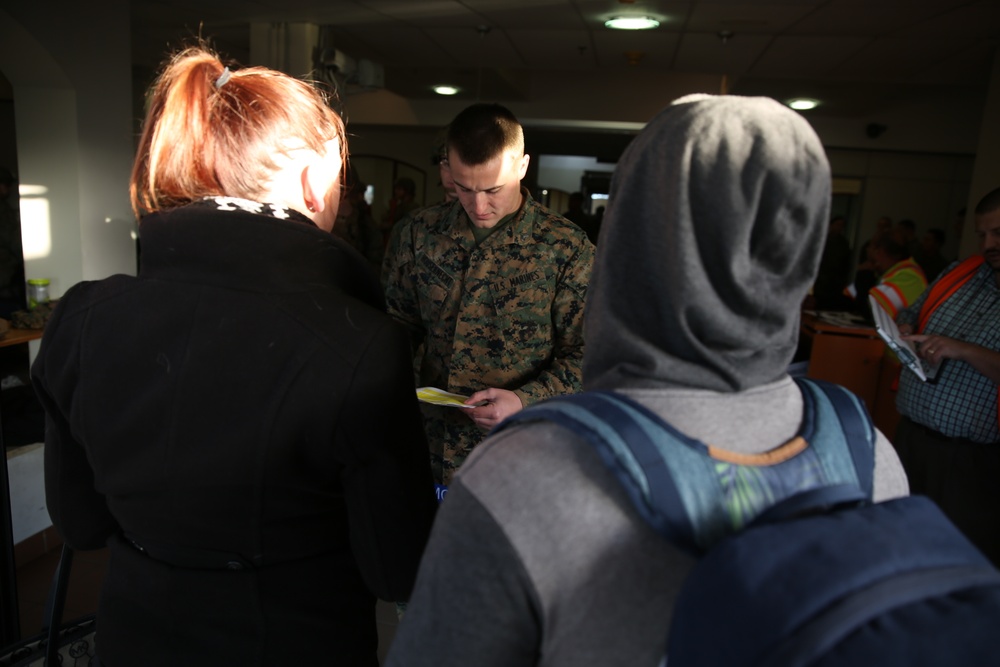 SPMAGTF-CR-AF Marines, sailors work with NAS Sigonella during evacuation control center exercise