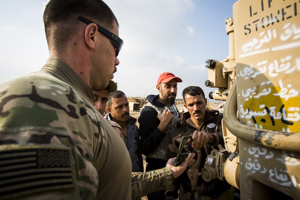 Fire for effect: U.S. Coalition Personnel Train Iraqi Soldiers on Artillery Techniques