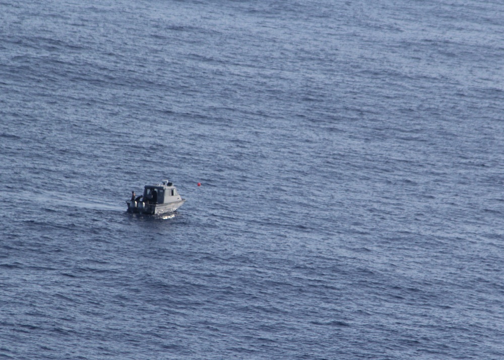 Navy crews conduct underwater search for Marine Corps helicopters off North Shore of Oahu