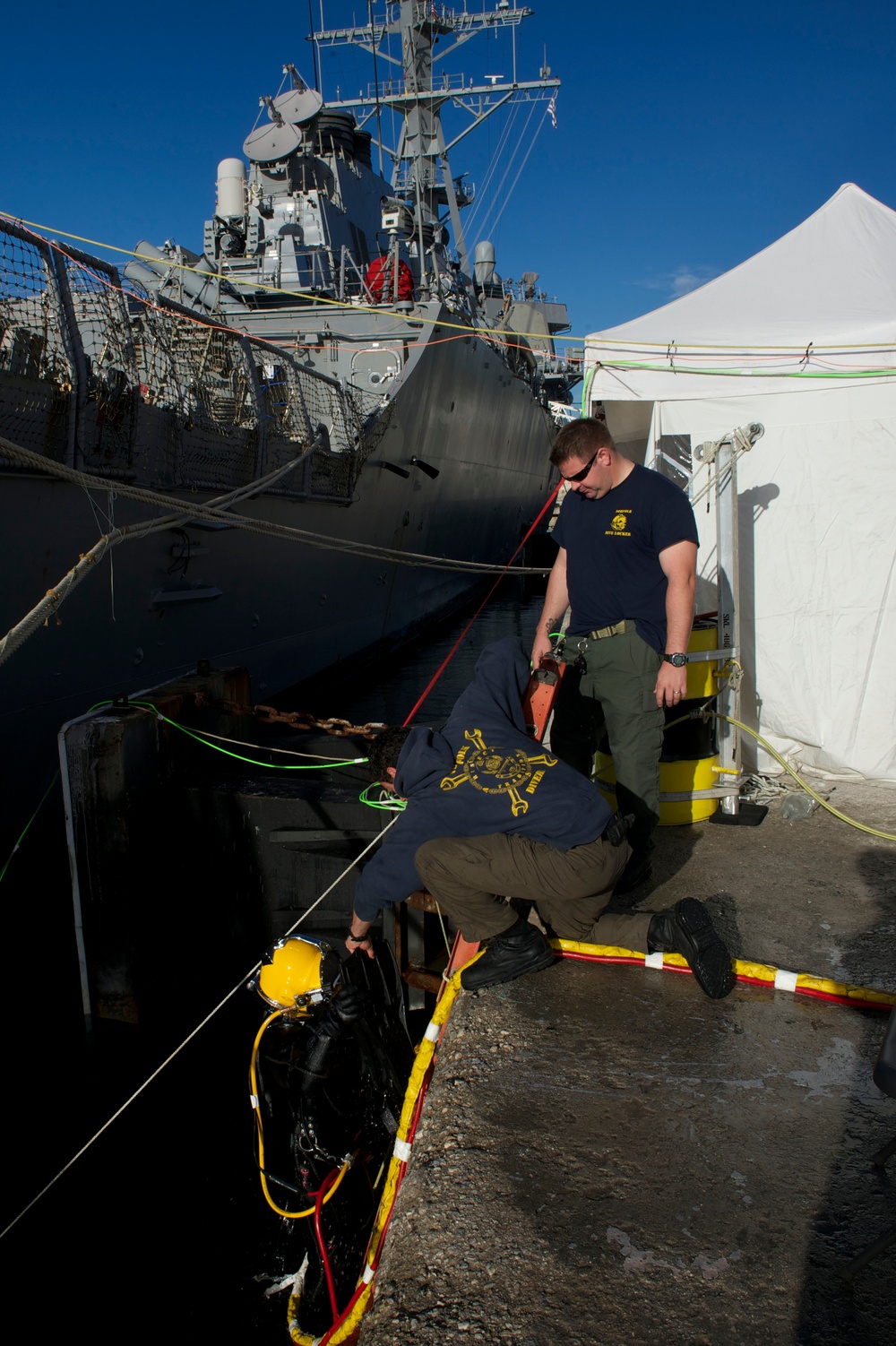 USS Carney sailors perform maintenance