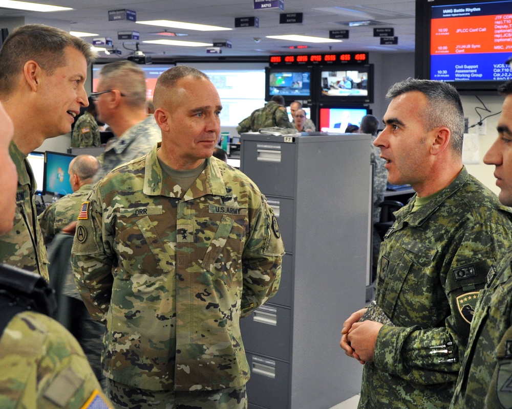 The deputy commander of US NORTHCOM and the adjutant general of Iowa speak to members of the Kosovo Security Forces