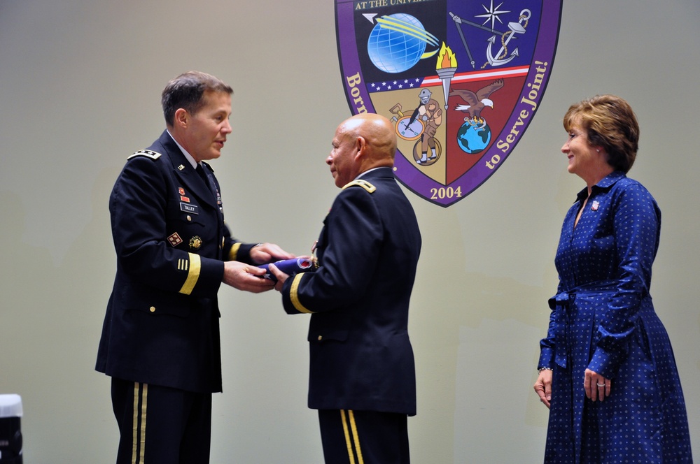 Maj. Gen. Luis Visot receives US flag during retirement ceremony