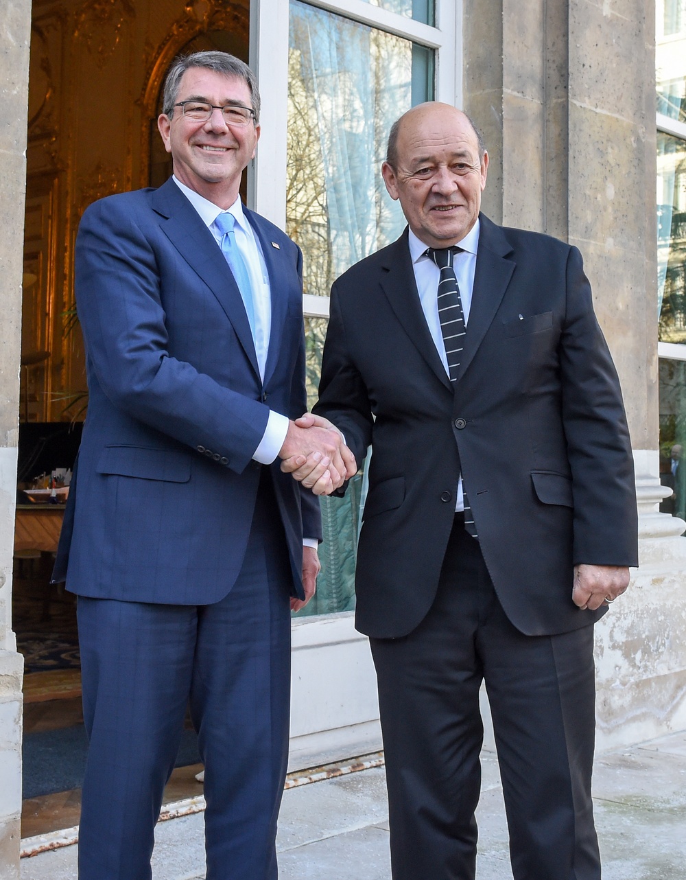 Secretary of defense, French minister of defense greet