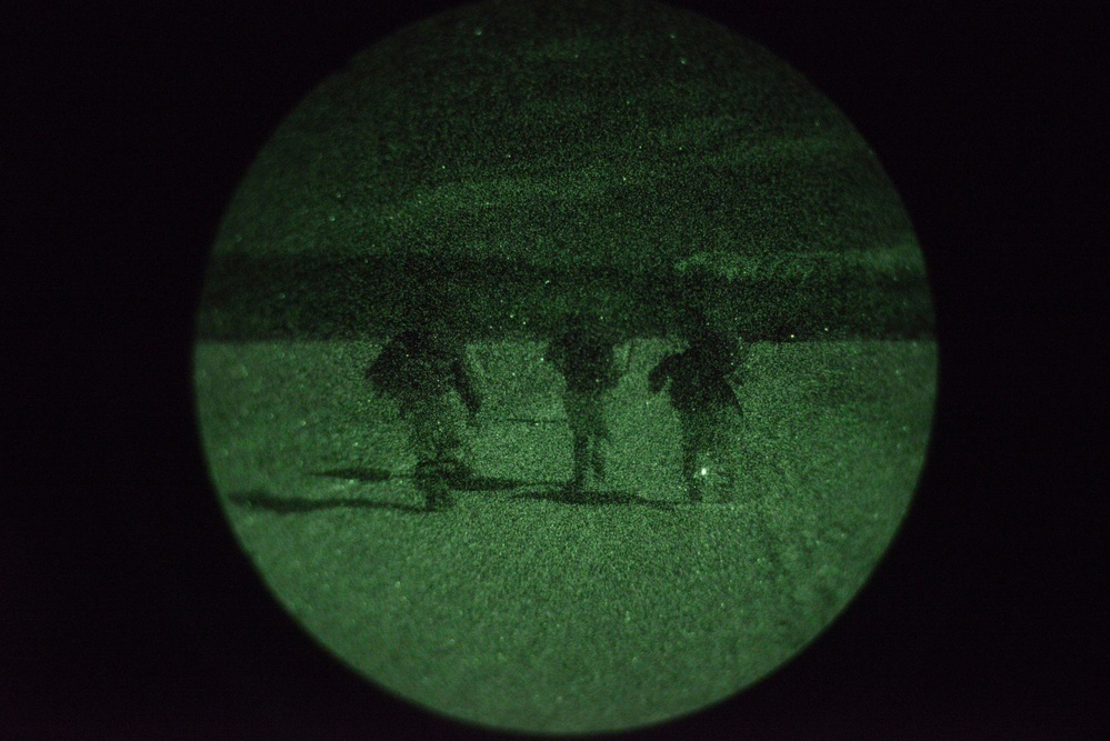 Spartan paratroopers conduct night jump operations