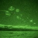 Spartan paratroopers conduct night jump operations