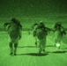 Spartan paratroopers conduct night jump operations