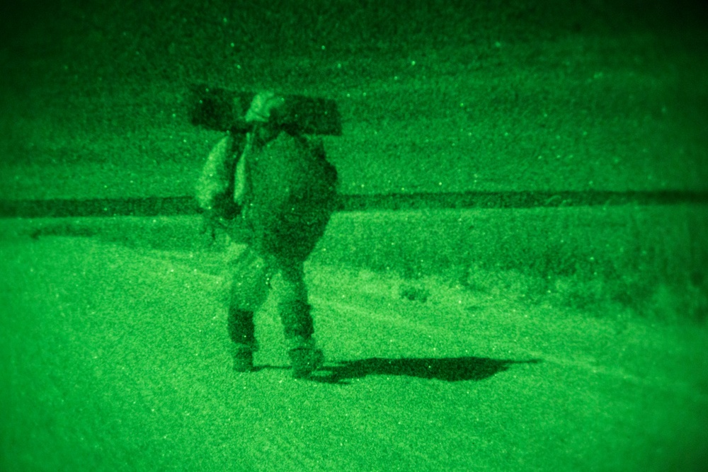 Spartan paratroopers conduct night jump operations