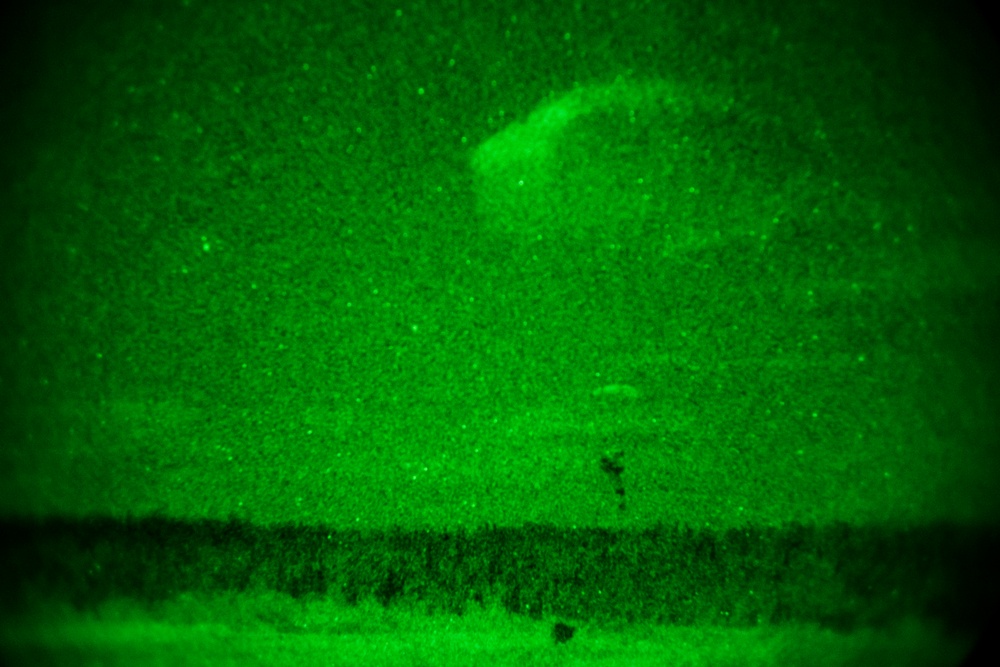 Spartan paratroopers conduct night jump operations