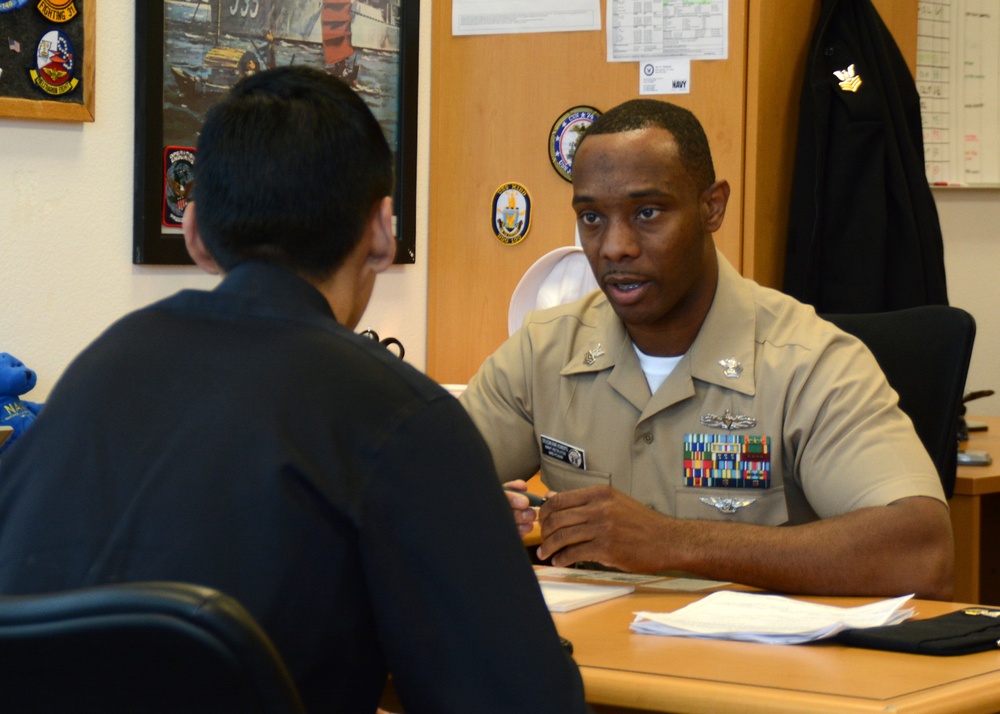 Navy Recruiter Explains Benefits of Service
