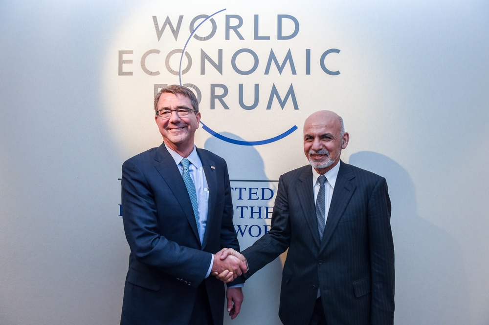 Secretary of defense takes a photograph with Afghan president