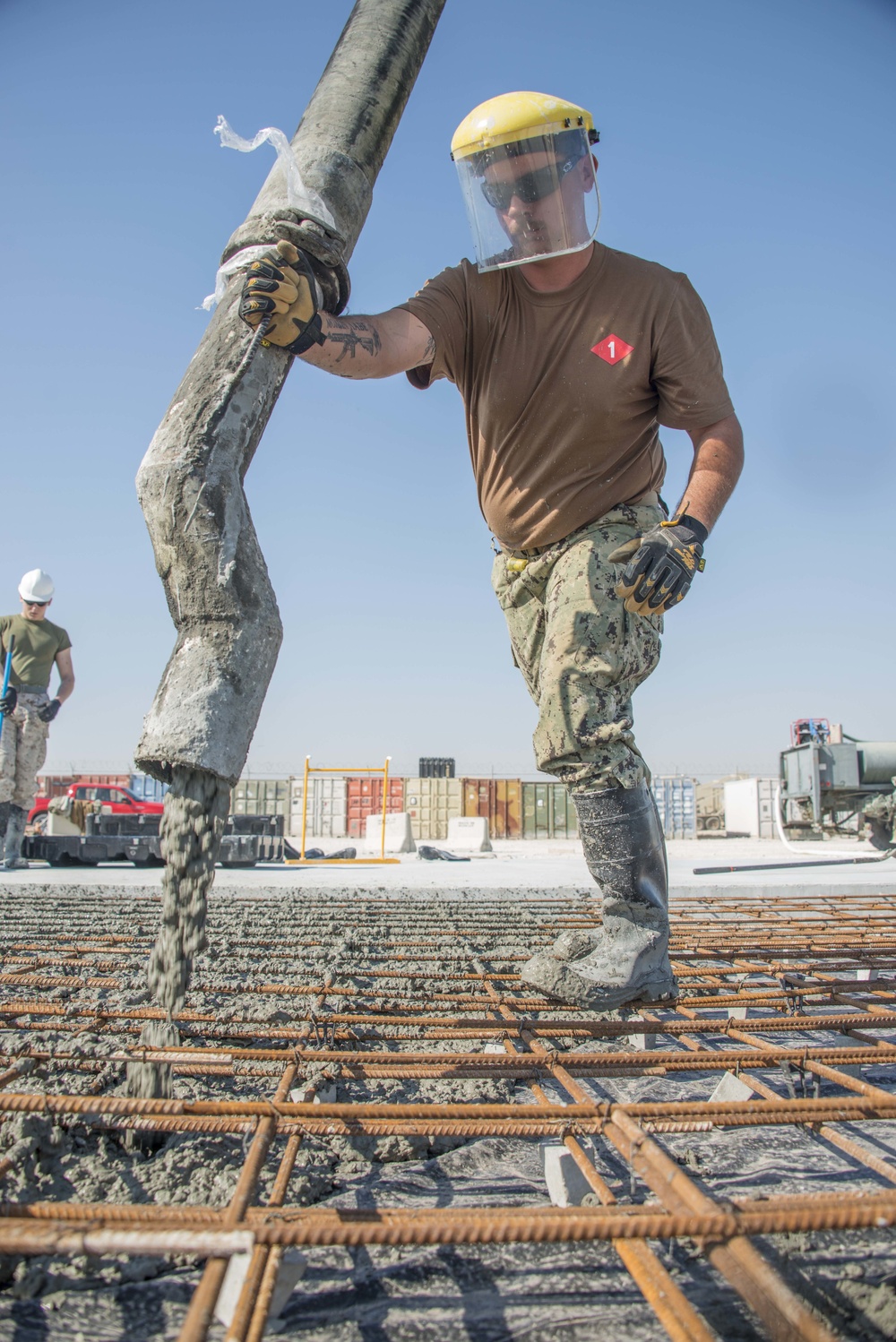 Navy Seabees build concrete pad in Bahrain