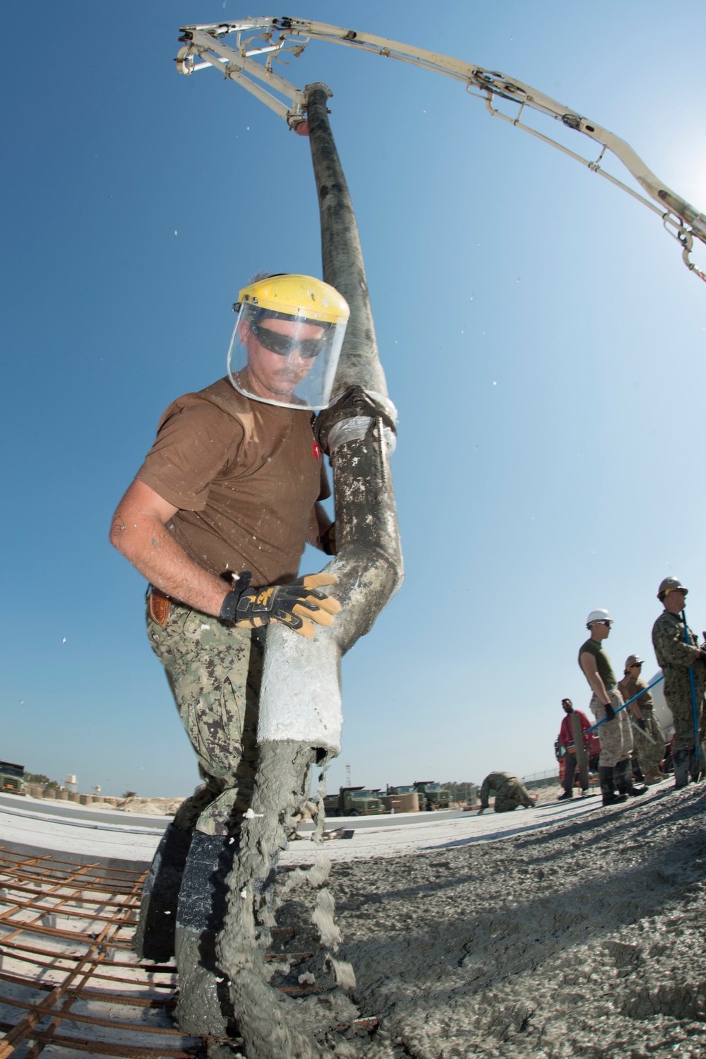 Navy Seabees build concrete pad in Bahrain