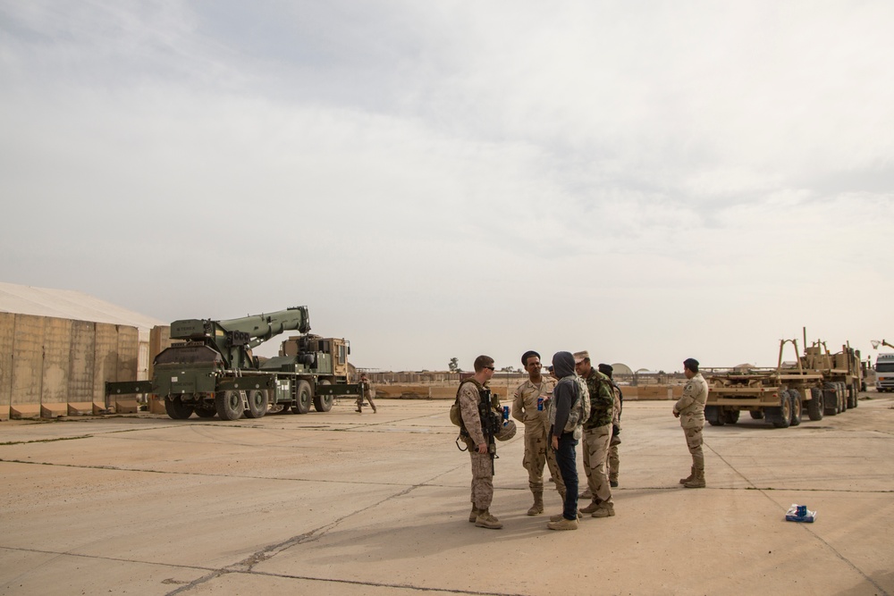 U.S. Marines, Iraqi Soldiers place barriers, reinforce protection for base