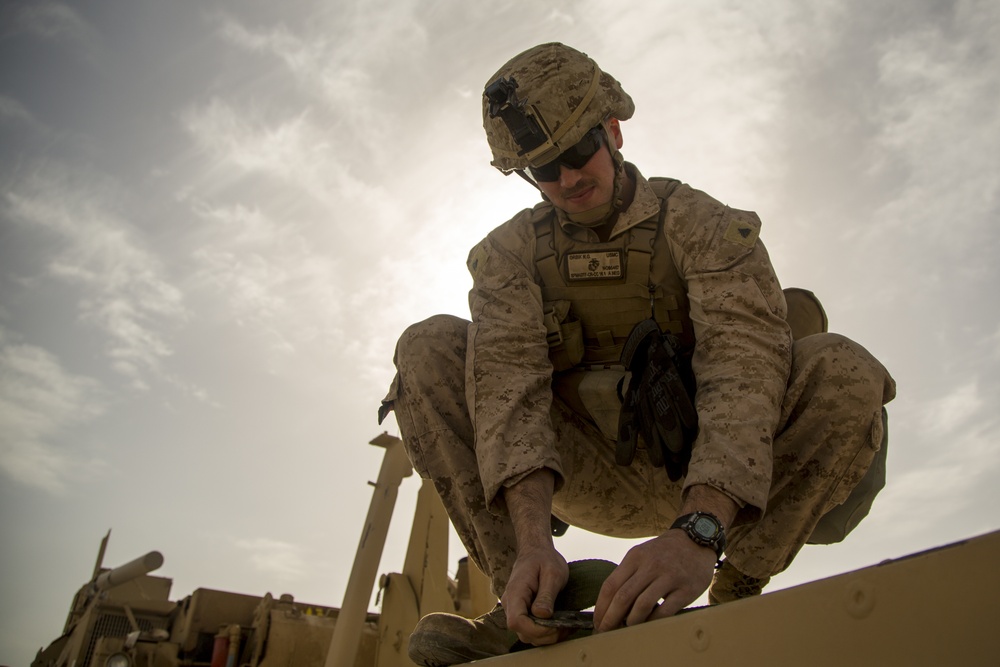 U.S. Marines, Iraqi Soldiers place barriers, reinforce protection for base