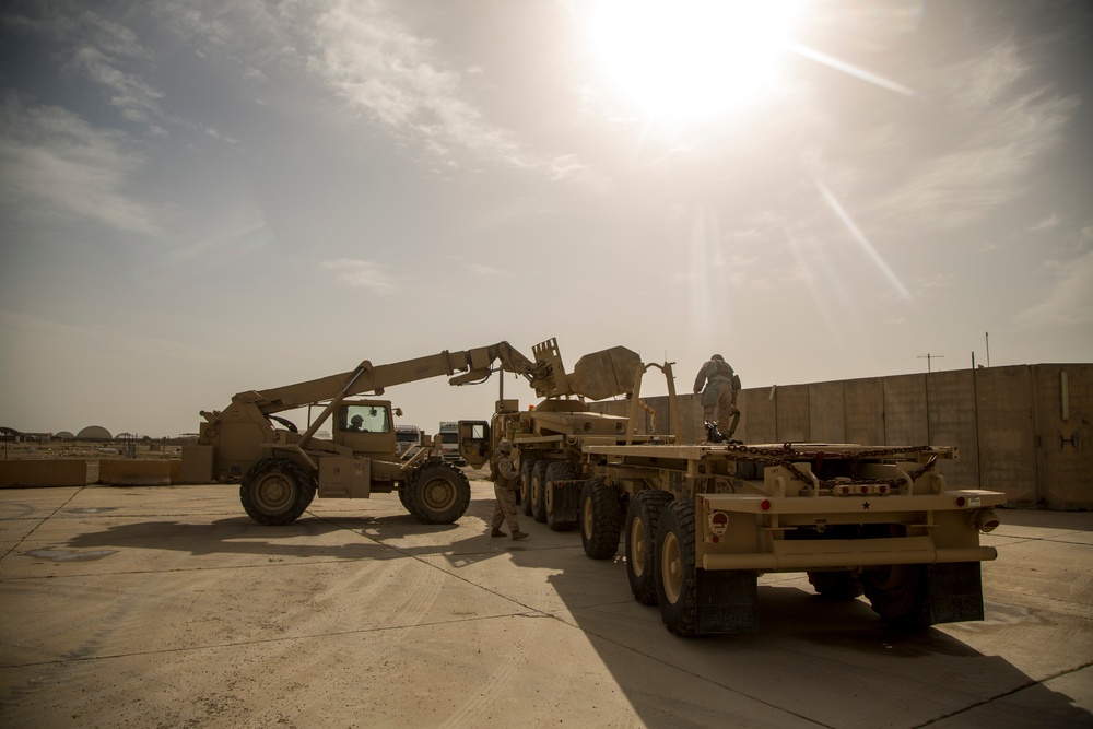 U.S. Marines, Iraqi Soldiers place barriers, reinforce protection for base