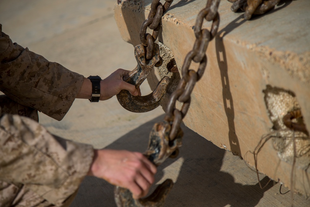 U.S. Marines, Iraqi Soldiers place barriers, reinforce protection for base