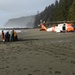 The Coast Guard helps remove trash from a beach near Neah Bay, Wash.