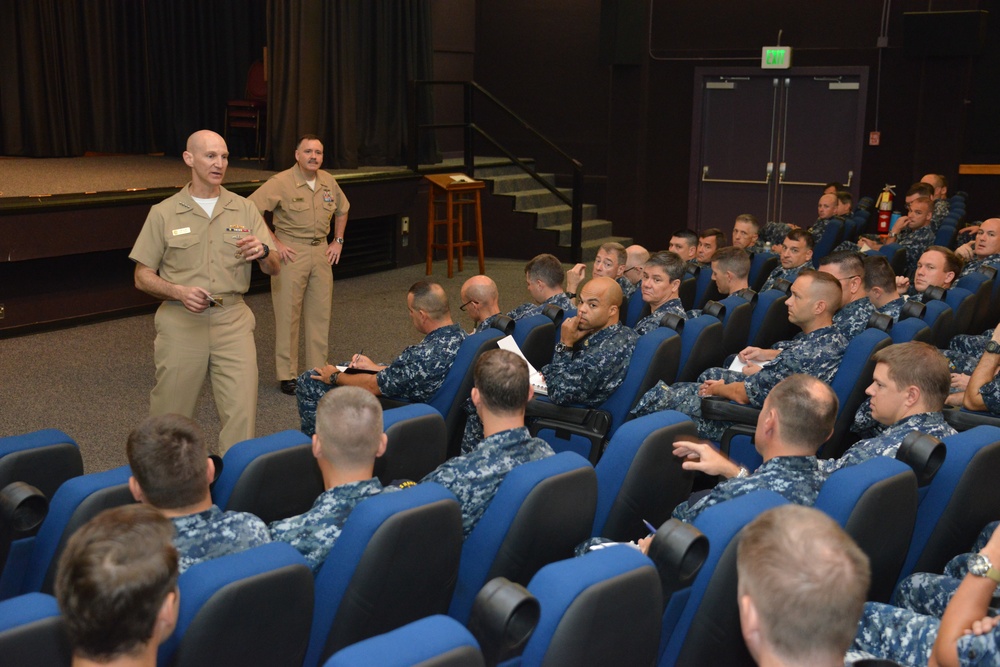 Adm. Frank Caldwell, director of the Naval Nuclear Propulsion Program speaks with leaders of the Pacific Submarine Force