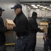 USS Germantown sailors load supplies