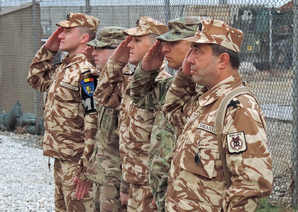 Bagram MPs conduct flag-raising ceremony to commemorate new PMO flag pole area