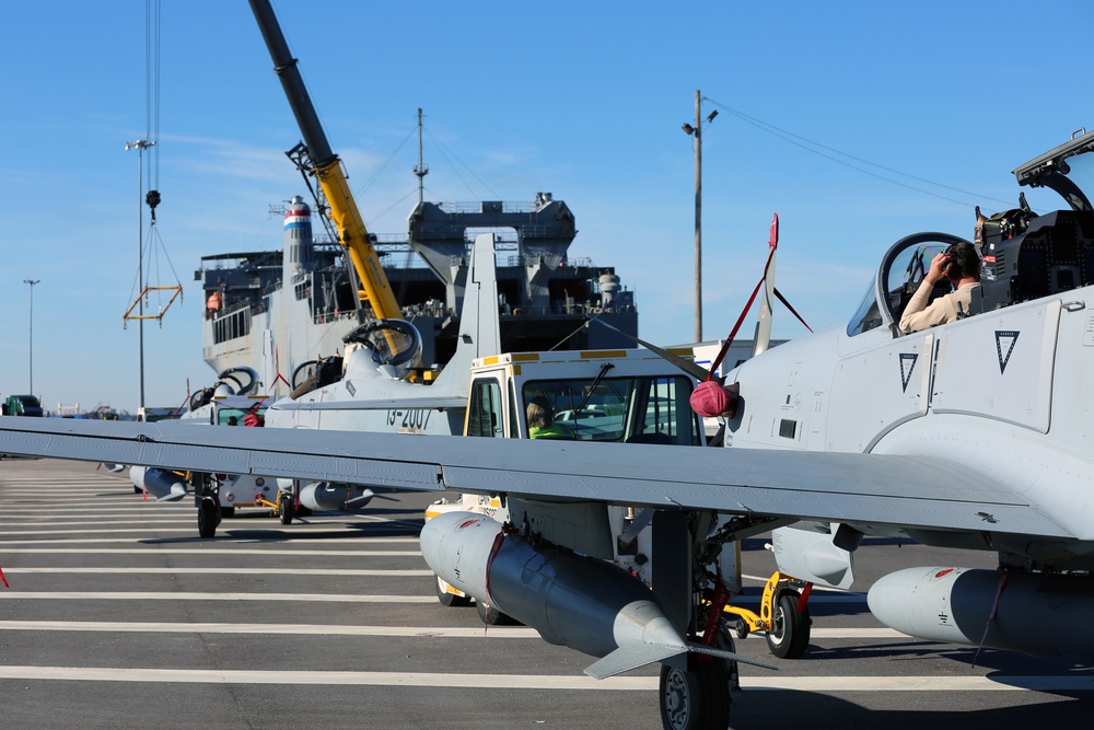 Cape Race loading four A-29 Super Tucano attack/training aircraft