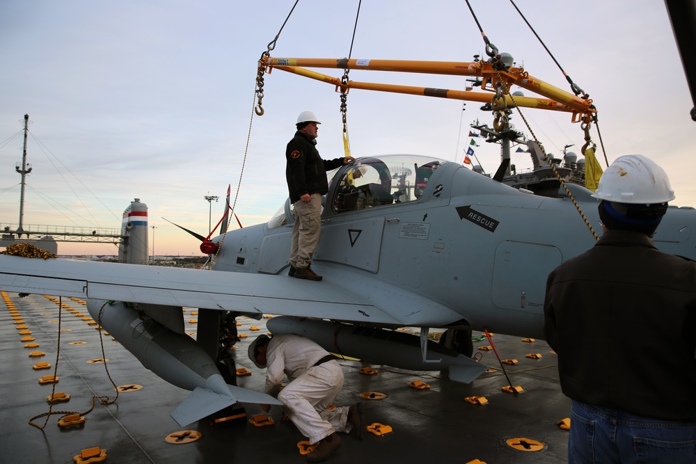 Cape Race loading four A-29 Super Tucano attack/training aircraft