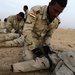 Coalition trainers provide Iraqi army squad movement, medical training