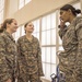 Female US Army ROTC cadets share a smile