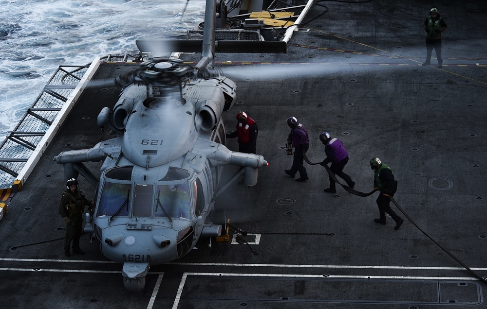 Refueling MH-60S Sea Hawk Helicopter