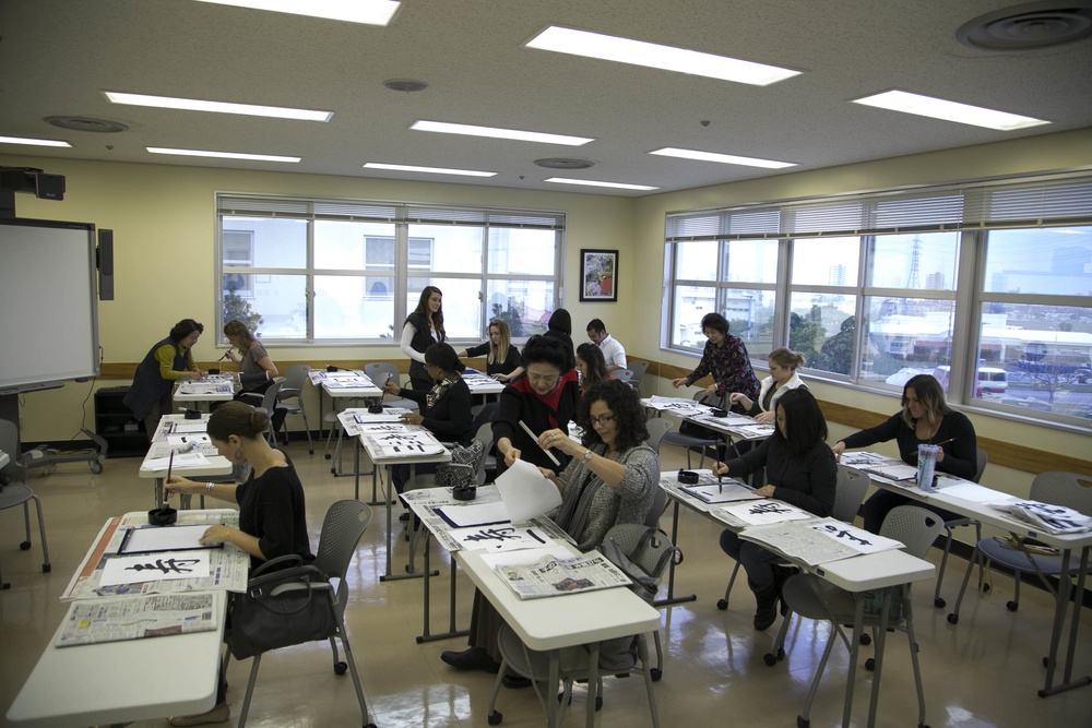 Status of Forces Agreement Personnel learn to write Japanese calligraphy
