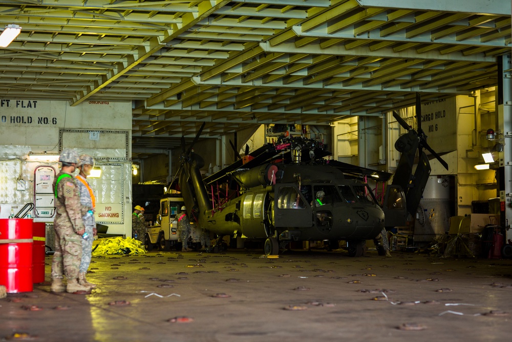 Royal Thai Navy and U.S. Service Members Offload from the USNS Maj. Stephen W. Pless