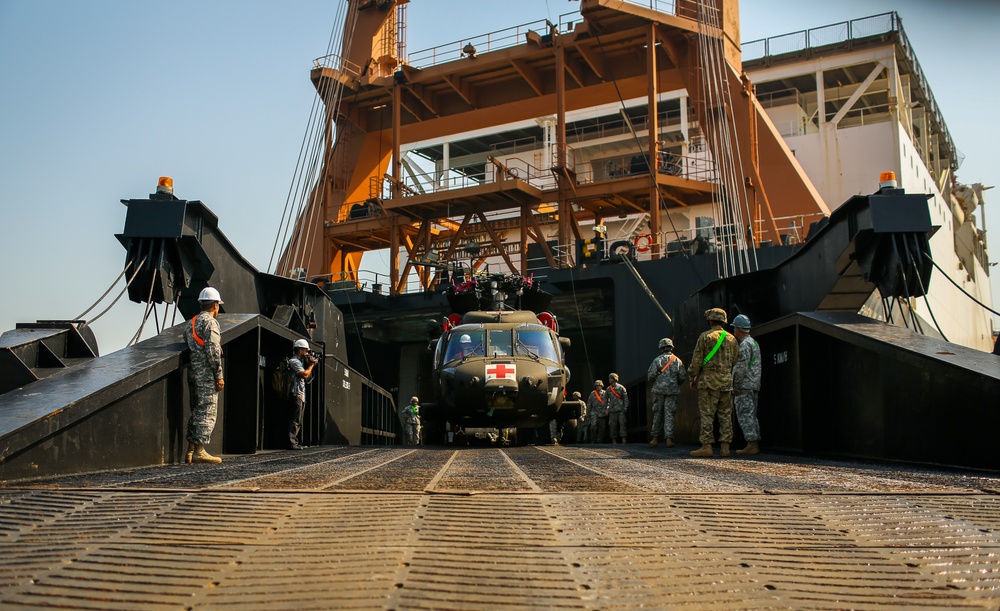 Royal Thai Navy and U.S. Service Members Offload from the USNS Maj. Stephen W. Pless