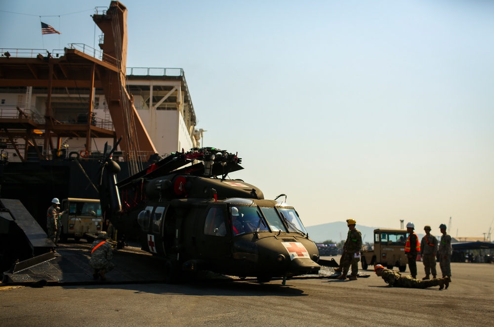 Royal Thai Navy and U.S. Service Members Offload from the USNS Maj. Stephen W. Pless