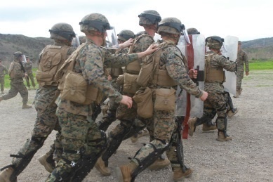 Law enforcement Marines keep the peace with combat engineers