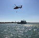 Coast Guard assists adults, children from sinking boat