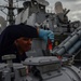 USS Carney sailors perform maintenance