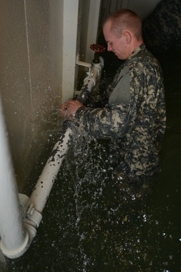 Watercraft operator students battle raging water